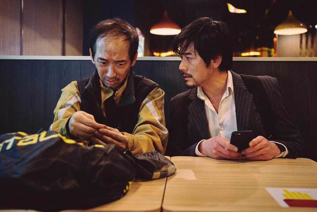 張達明（左）與郭富城在電影《麥路人》有對手戲。（華映娛樂提供）