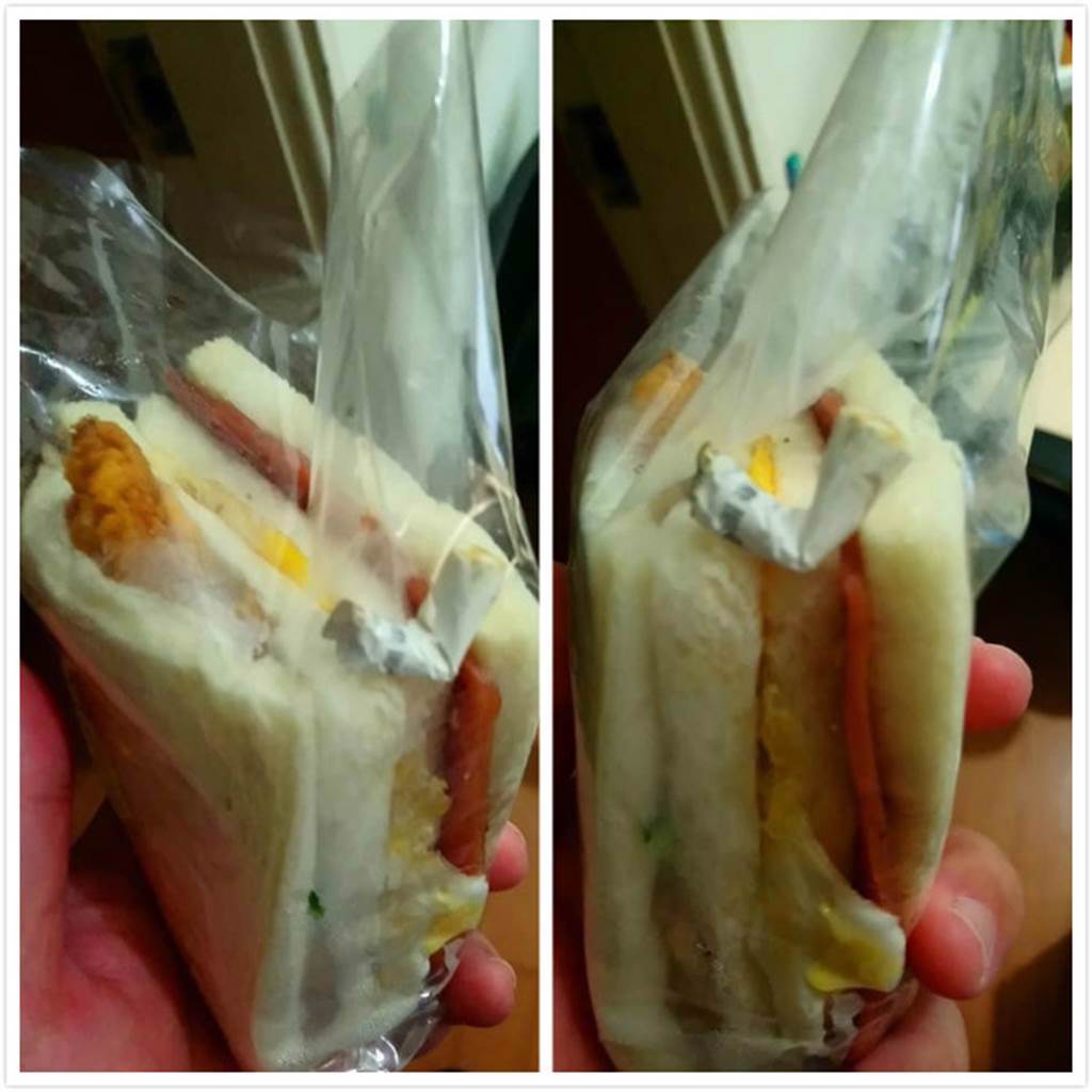 一名網友PO出外送來的三明治，竟然有一整根菸蒂在食物包裝裡。(圖/截自爆料公社)