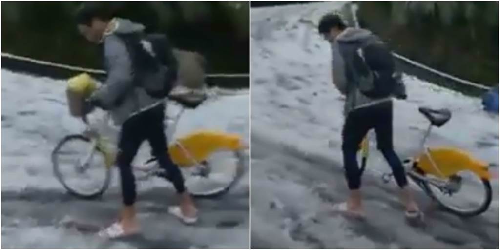 一名男子穿著拖鞋，牽著一台Ubike上陽明山賞雪，不少民眾看傻眼直呼「好危險」。（圖／翻攝自臉書爆廢公社公開版）