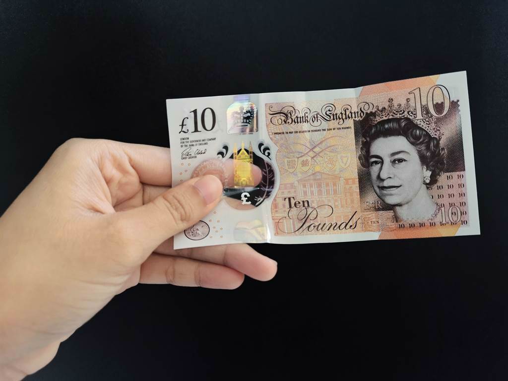 英國一名老翁日前意外領到一張罕見的「無臉人」紙鈔。(示意圖／達志影像)