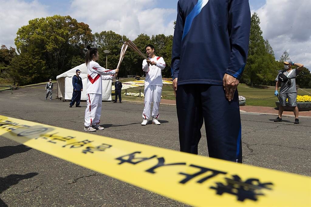 東京奧運聖火傳遞傳出一名指揮交通的30歲員警確診新冠肺炎。（資料照／美聯社）
