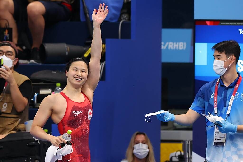 加拿大游泳女將瑪格麗特26日拿下東奧女子100公尺蝶式金牌。(路透)