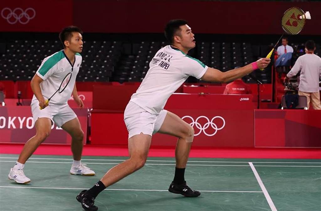 中華隊李洋、王齊麟擊敗英國對手，拿下東奧男雙小組賽首勝。（路透）