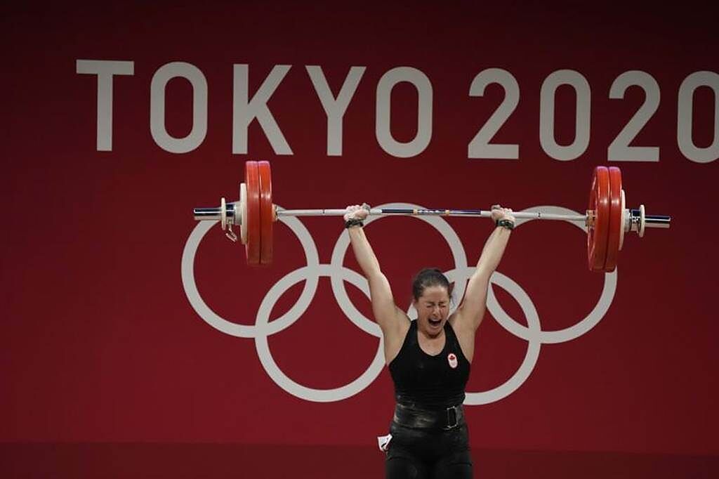 東奧女子64公斤級舉重金牌查倫，成績為236公斤。（美聯社）