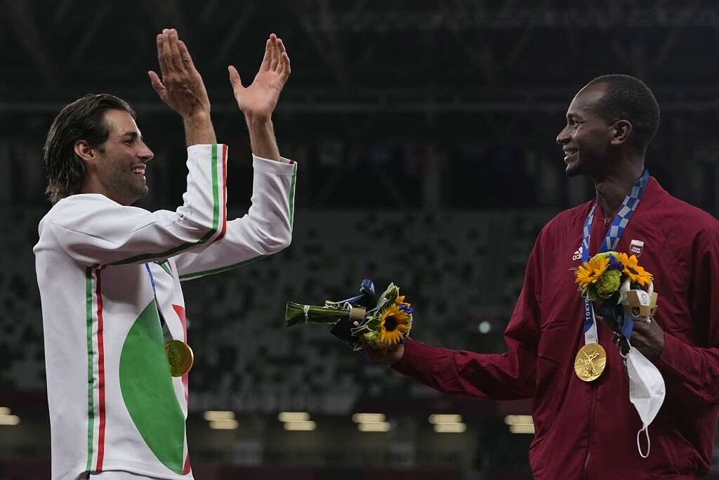 東奧男子跳高決賽，義大利、卡達兩位國手同意一起領取金牌，因此單一項目出現兩個金牌選手。（美聯社資料照）