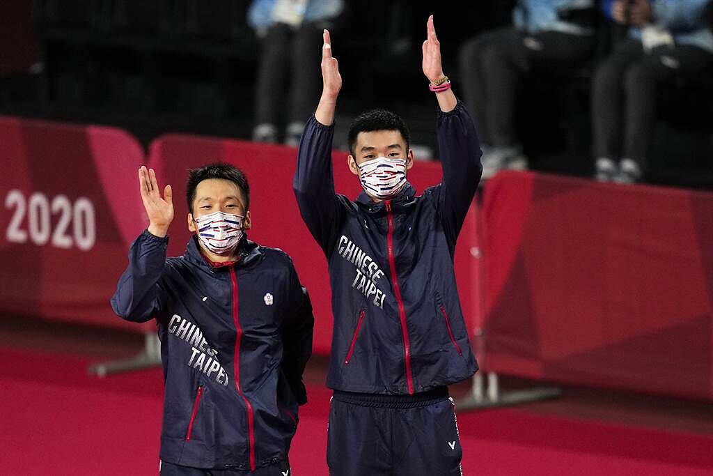 中華隊終於奧運拿到羽球獎牌，李洋（左）、王齊麟（右）更摘下史上首金。（資料照／美聯社）