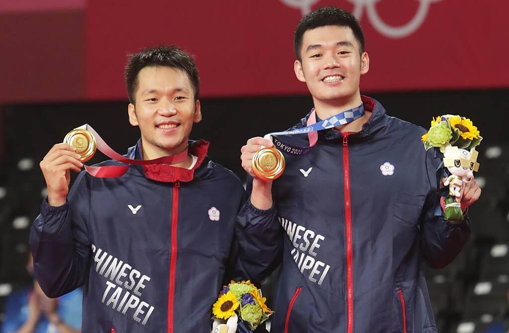 王齊麟、李洋因在東奧奪下羽球男雙金牌。(圖／本報系資料照)