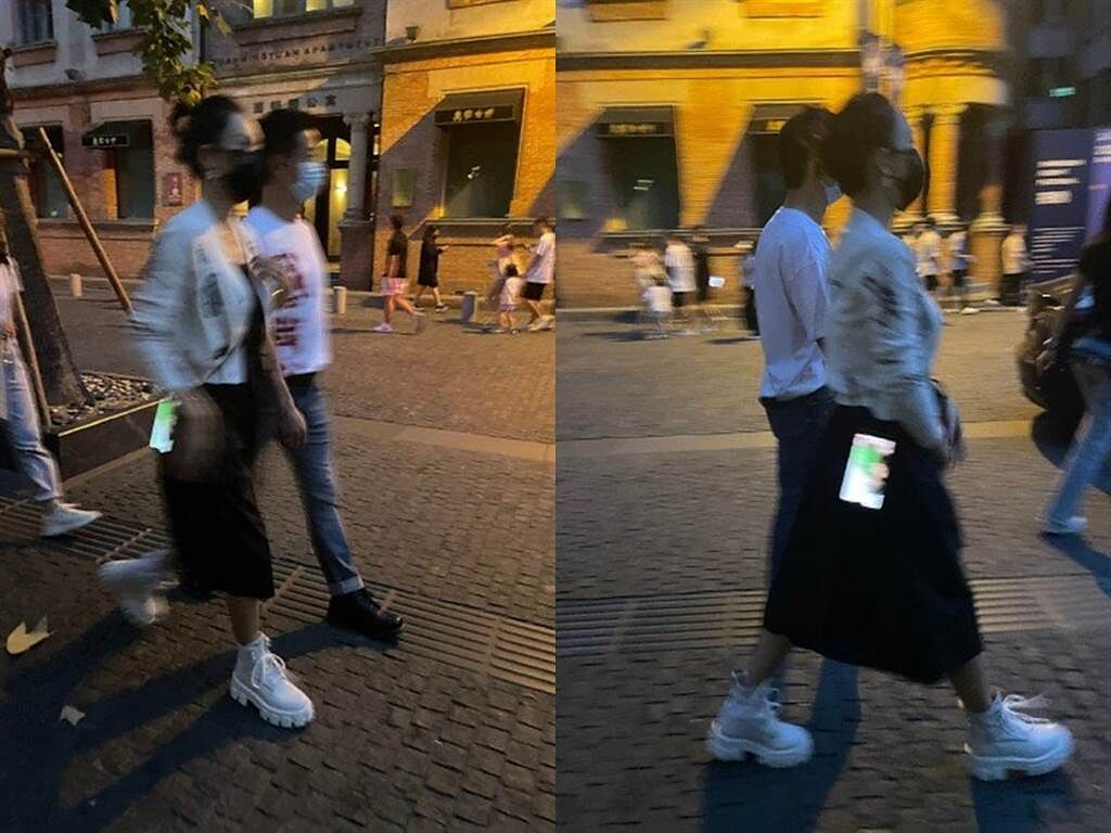 章子怡和吳京走在上海街頭被偷拍，連手機螢幕畫面都被看光。（圖／微博）