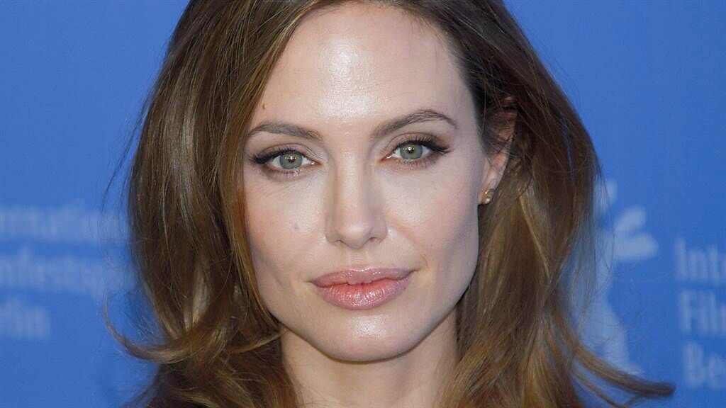 安潔莉納裘莉（Angelina Jolie）近日接受專訪時承認吃過浪味仙並說出真實感受。（圖／達志影像）