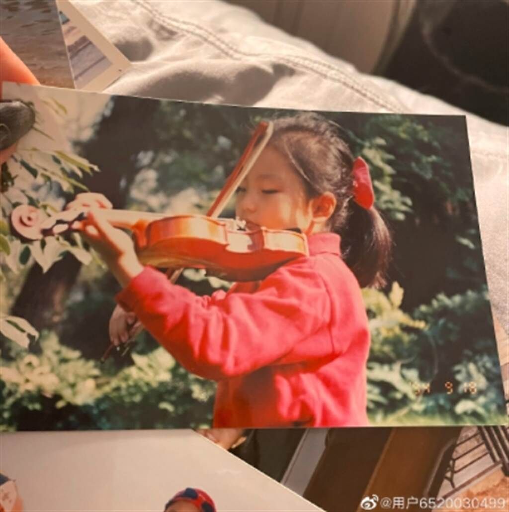 周揚青6歲時練小提琴被父親打。(圖／周揚青微博)