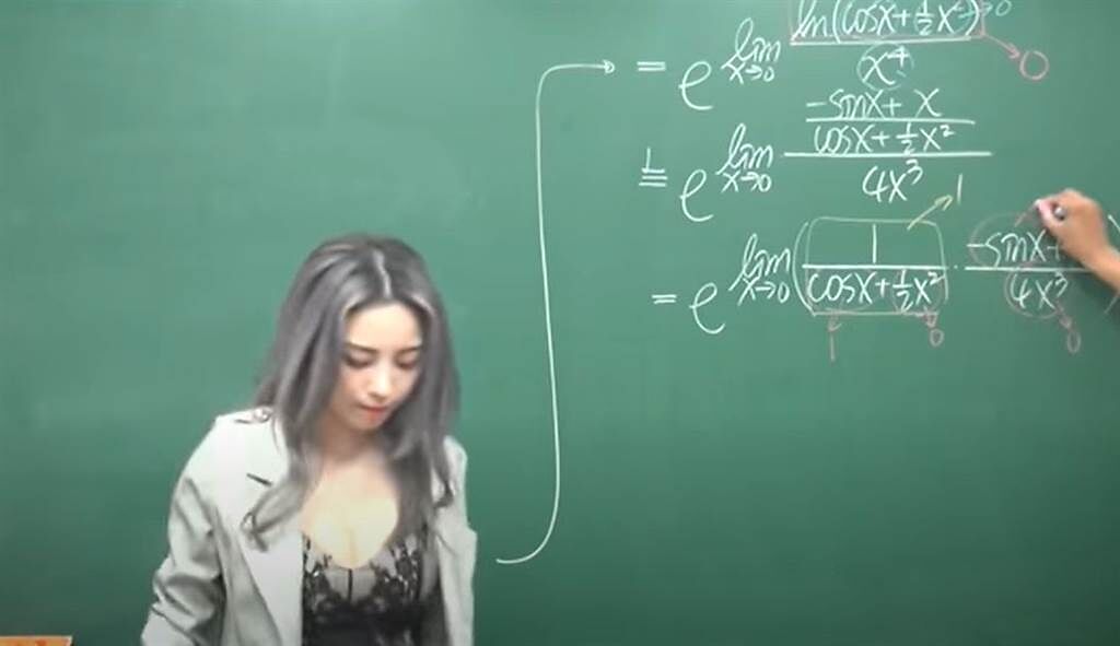 長髮正妹在微積分課上台擦黑板，一轉身掀起網友熱烈討論。（圖／翻攝自YouTube／數學老師張旭）