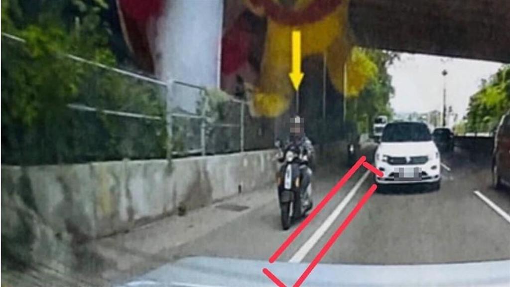 網友騎車跨越道路邊線，遭民眾檢舉開罰。（圖／翻攝自爆怨2公社臉書）