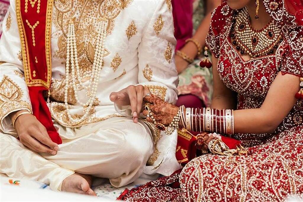 印度一名新娘發現未來丈夫竟是禿頭，氣得當場暈倒，之後更直接退婚。(示意圖/達志影像)
