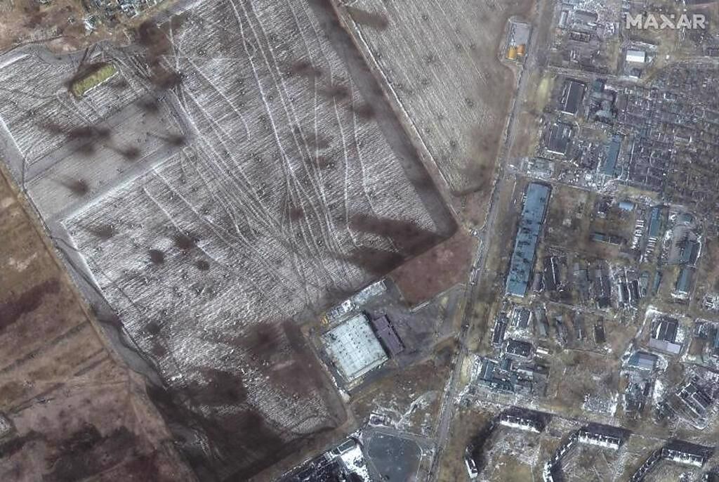 俄烏持續交戰，衛星影像顯示，烏克蘭東南部圍城馬立波受損嚴重。(圖/美聯)
