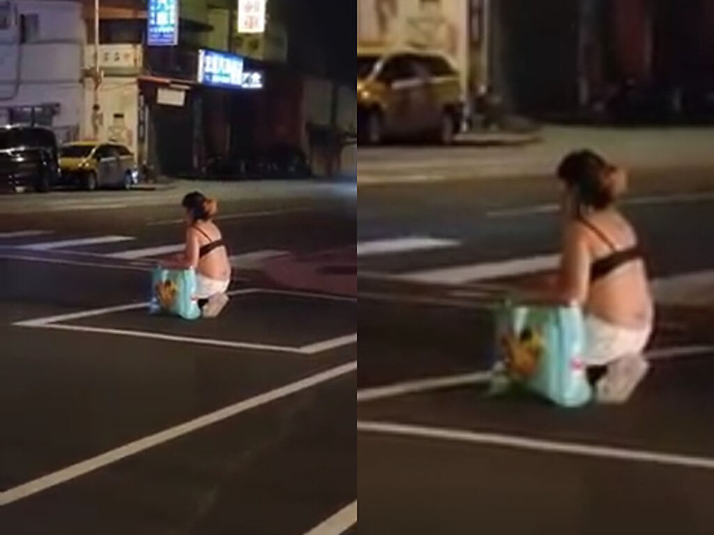 1名網友日前在十字路口目擊1名上半身僅穿內衣的女子坐在「機車待轉區」內，當時路面車流不小、相當危險。（翻攝自臉書「爆料公社二社」）