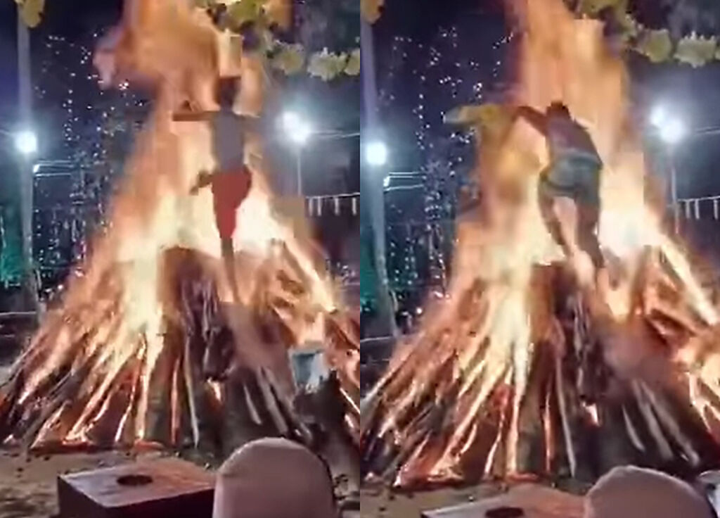 國外某種「過火儀式」，只見年輕男子不斷的往火裡衝，驚呆一票網友表示「摔倒就GG了」。（翻攝自臉書爆廢公社）