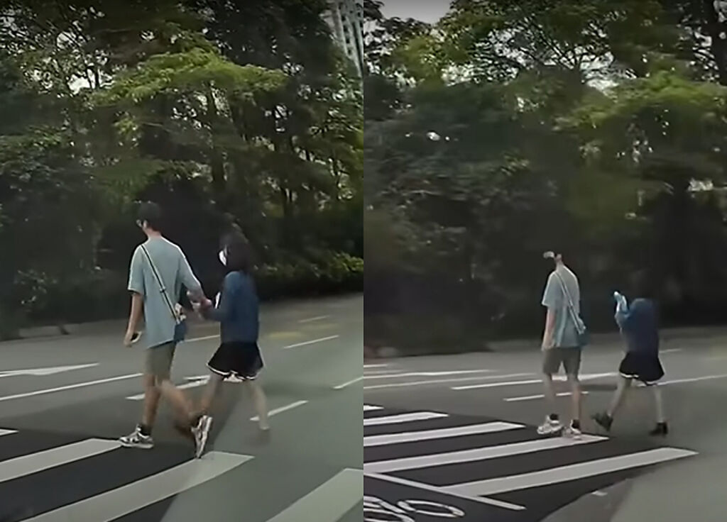 男子開車欲在路口右轉時，突然看見要過斑馬線上的年輕男生牽起女生的手，此畫面被拍下也閃瞎一票網友。（翻攝自YouTube頻道「WoWtchout - 地圖型行車影像分享平台」）