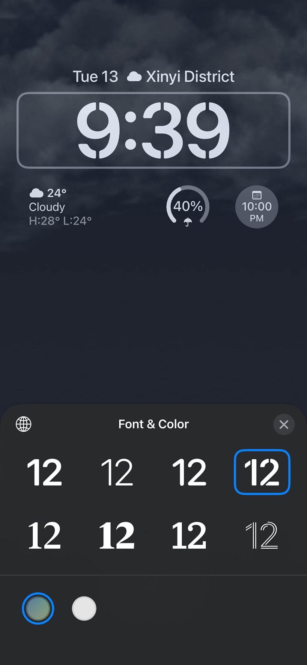 蘋果全新iOS 16的「鎖定畫面」，時間、日期欄也能作自訂顏色、樣式等更改。（翻攝手機畫面）