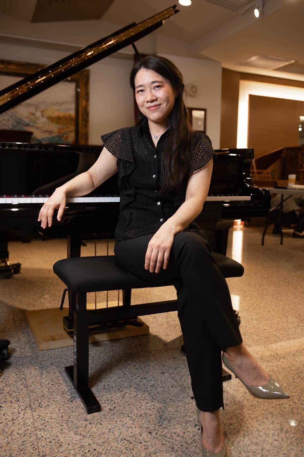 鋼琴家胡瀞云在追藝道路上，也曾感到孤單，但如今她活在最愛的音樂裡，也樂於給予，不再孤單。（郭吉銓攝）
