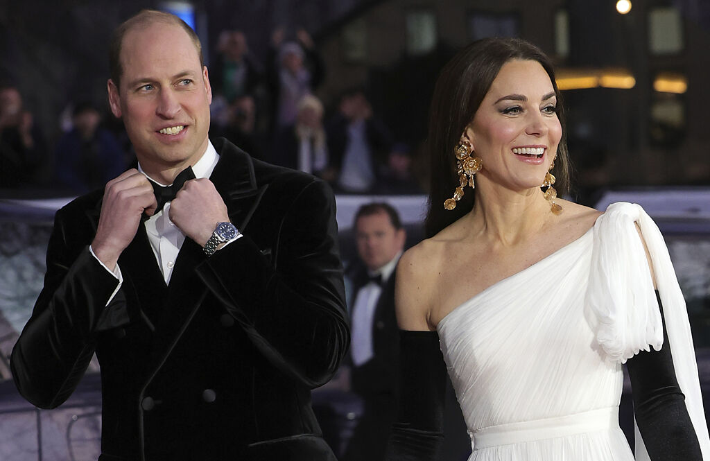 威爾斯親王威廉（左）19日和妻子凱特在倫敦出席有英國奧斯卡之稱的英國影藝學院電影獎（BAFTA Awards）頒獎典禮。